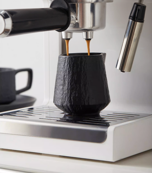 Ceramic sauce pourer with spout design - handcrafted dinnerware for fine dining