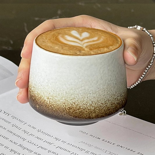 Gradient ceramic coffee mug with ergonomic handle design - artisanal tableware