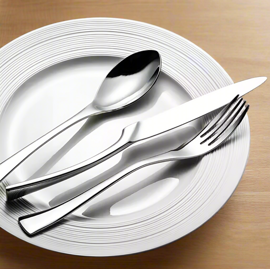 Stainless steel fork and knife set with sleek finish - handcrafted cutlery for fine dining