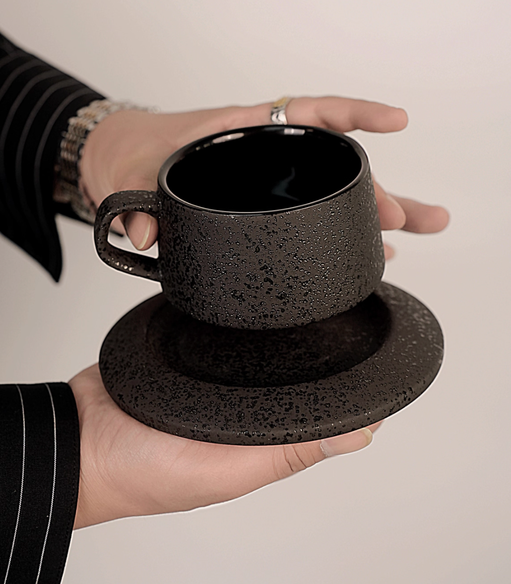 Ceramic coffee cup with saucer from above showing interior design