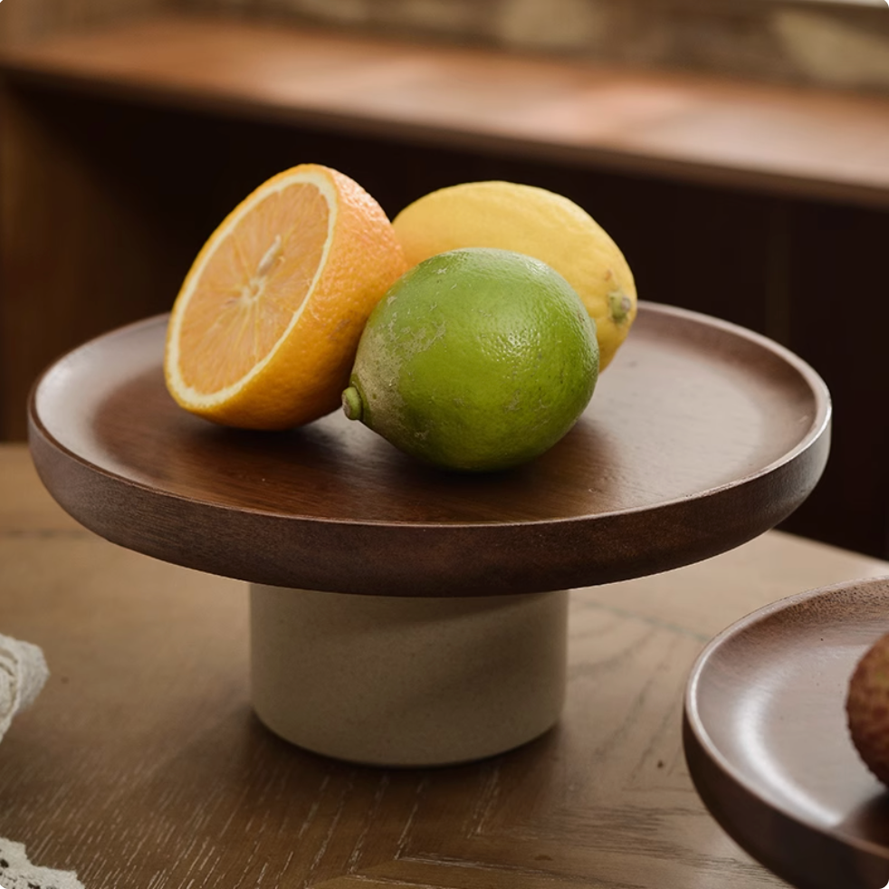 Wooden serving platter stand styled with artisanal serving plate for modern dining experience