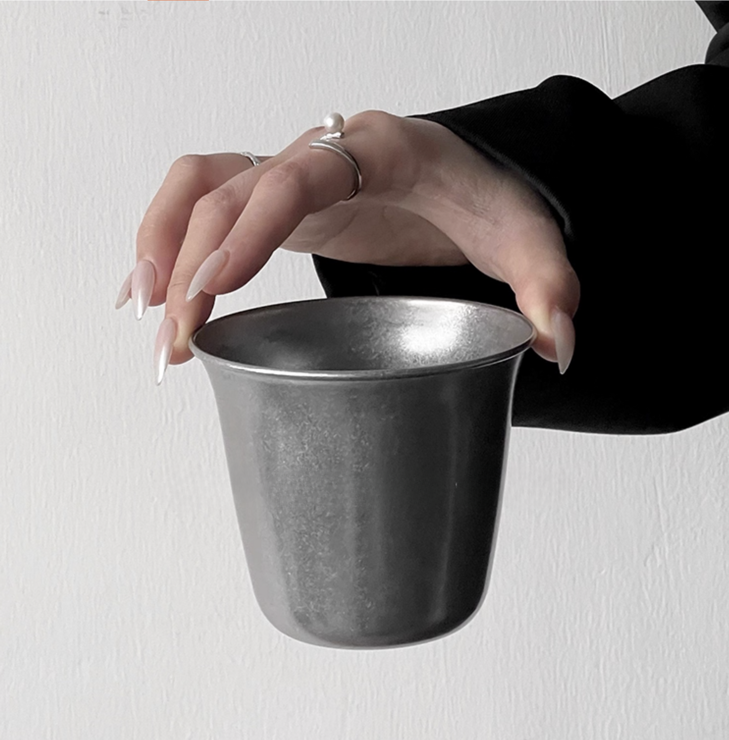 Stainless steel cup styled for Singapore café restaurant modern dining experience