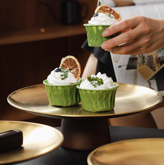 Close-up view of handcrafted stainless steel serving platter stand showing premium construction and finish