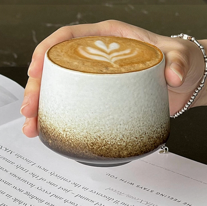 Gradient ceramic coffee mug with ergonomic handle design - artisanal tableware
