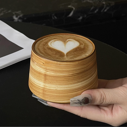 Handcrafted ceramic coffee cup with smooth finish - artisanal dinnerware for cafes
