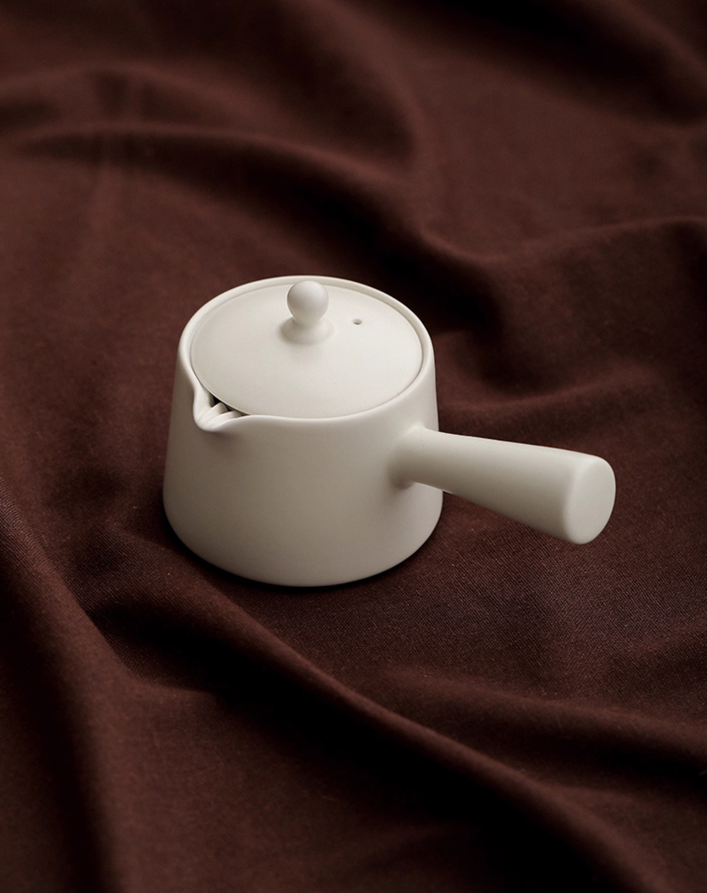 Handcrafted Wabi Sabi ceramic teapot with natural imperfections and artisanal design