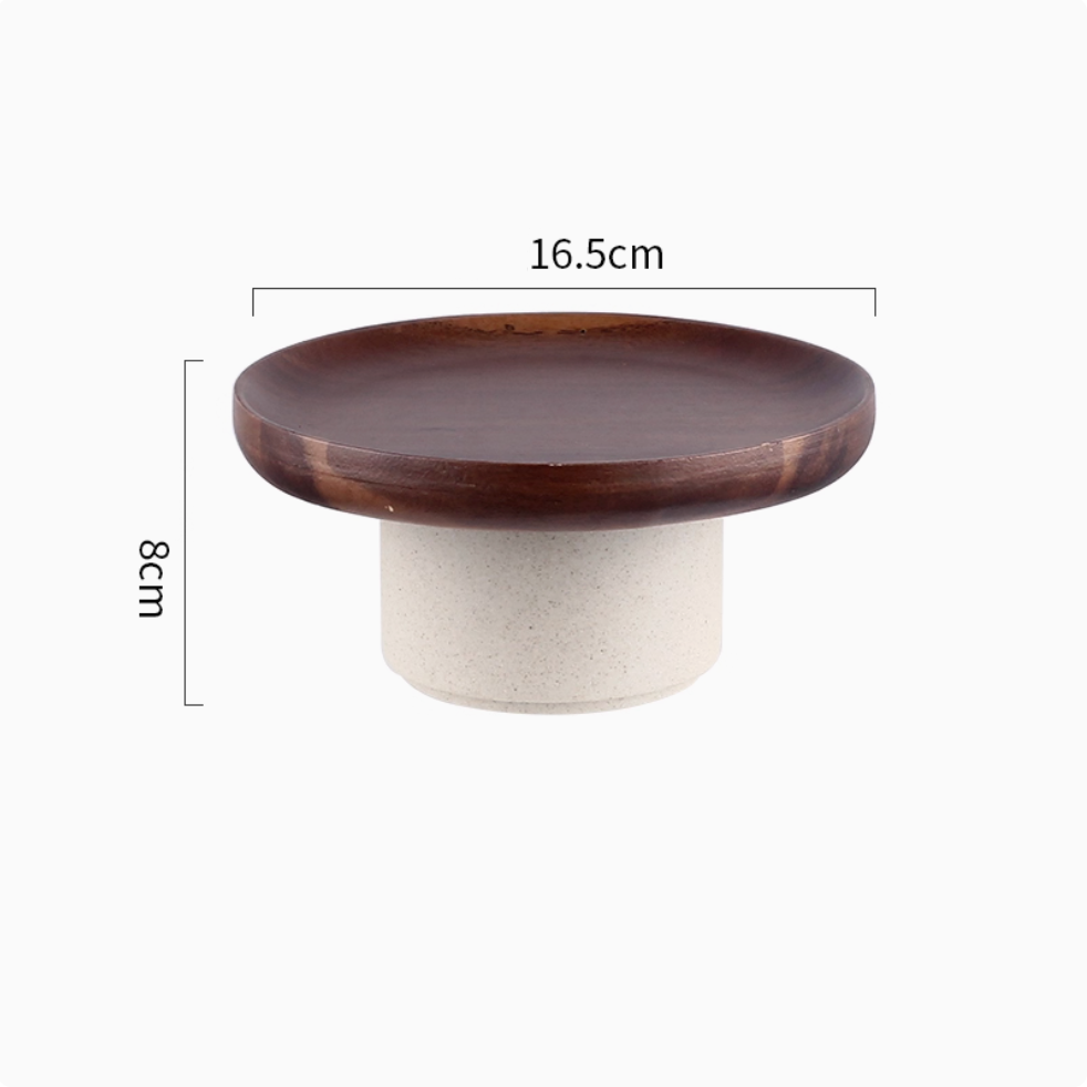 Side view of handcrafted wooden serving stand showing elegant proportions and natural materials